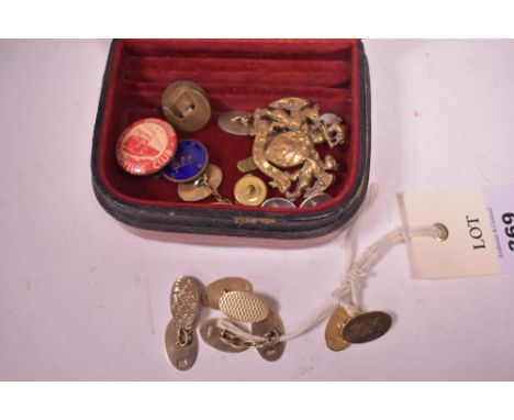 Two pairs of 9ct yellow gold cufflinks, one with engraved initials and engine turned decoration, the other engraved with init