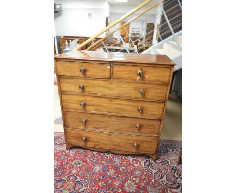A 19th Century mahogany chest of drawers, with rectangular top above an arrangement of two short over three long graduated dr