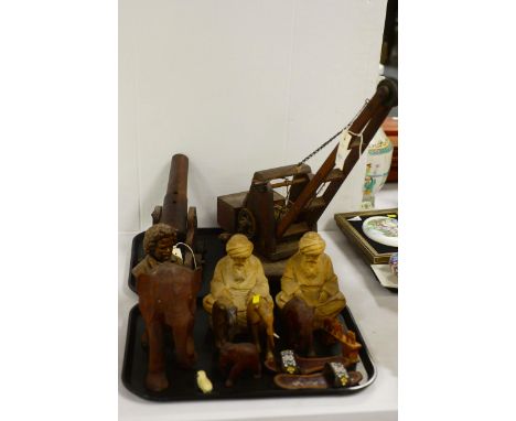 A vintage wooden crane toy; a wooden cannon toy; together with a tray of carved wooden elephants; a bronzed bust of Beethoven