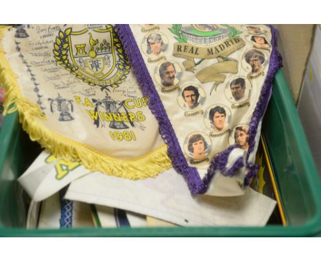 A box of Vintage football memorabilia, including: pennants and rosettes from Tottenham Hotspur; Real Madrid; Barcelona; Leeds