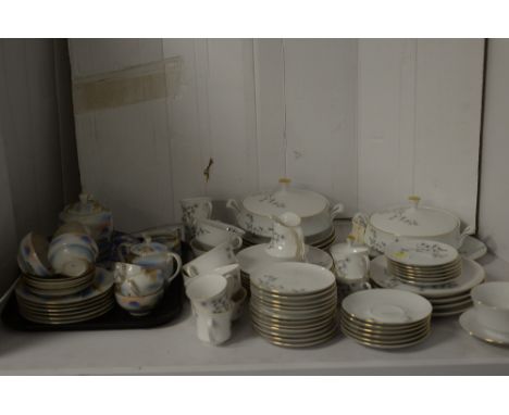 An Eschenbach dinner set, to include: tureens, various plates, cups, saucers, jug, sugar bowl, soup bowls and others; a Japan