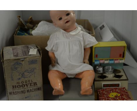 A box of vintage dolls, board games; Mettoy Playthings model Hoover washing machine in box; toy cooker; doll's house furnitur