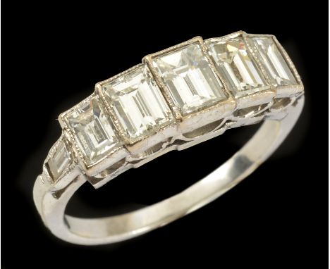 A Diamond five stone Ring millegrain-set graduated step-cut stones, estimated total diamond wieght 1.38cts, with baguettes to