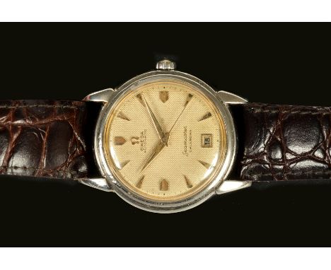 A Gentleman's Omega Seamaster Automatic Wristwatch the textured champagne dial with hourly chevron markers, sweep seconds han