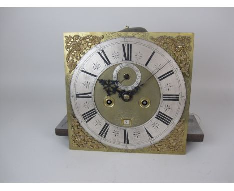 An 18th Century Longcase Clock Movement with square brass dial having silvered chapter ring inscribed Ben Merriman, London, s