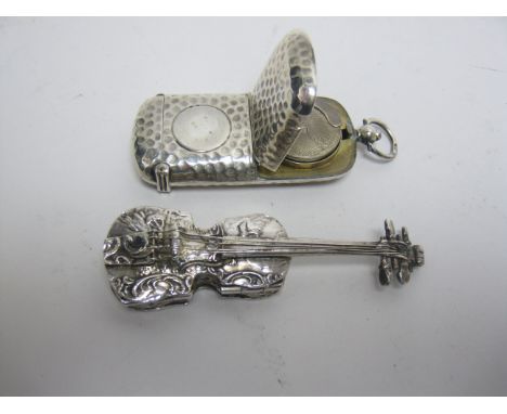 An Edward VII silver combined Vesta and Sovereign Case with hammered design, Sheffield 1903, and a Continental silver Trinket