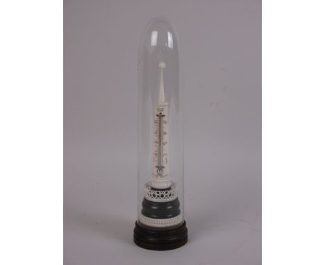 A 19th Century carved ivory Thermometer in the form of an obelisk under glass dome, 9 1/4 in H