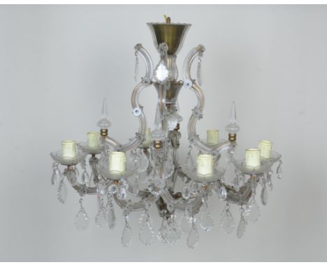 A Venetian glass eight branch Chandelier with applied rosettes and pear shape pendant drops