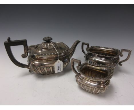 A George V silver three piece Tea Service of boat shape, Birmingham 1911