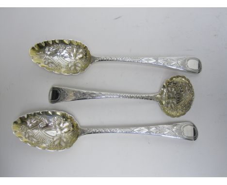 A pair of George III silver Berry Spoons and a Sifting Ladle, London 1814, maker; R Rutland, in case