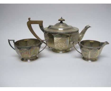 A George V silver circular three piece Tea Service, Sheffield 1930