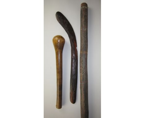 Aborigine painted Didgeridoo and Boomerang, former probably Arnhemland, 47 1/2in. L, latter with broadly adzed faces and sign