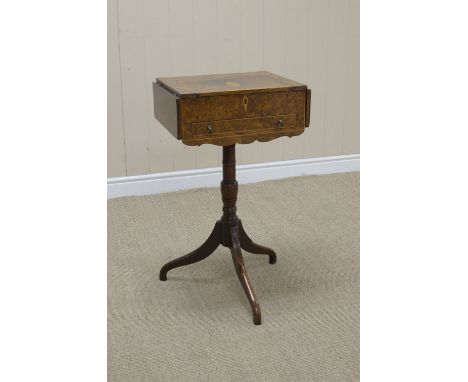 A Regency burr oak Work Table with satinwood inlay having hinged top, drawer and fall flaps on vase turned column and tripod 