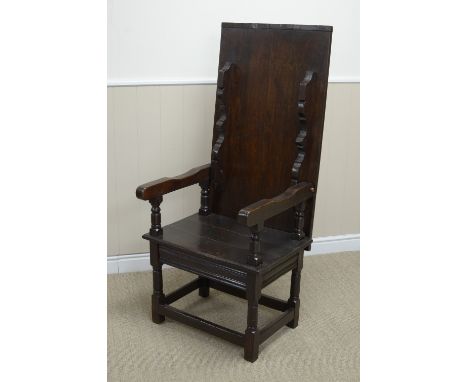 An antique oak Monk's Bench with adjustable top/back, solid seat above drawer on turned and square supports united by square 