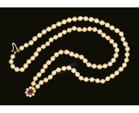 A double row Cultured Pearl Necklace on amethyst and pearl cluster clasp in 9ct gold