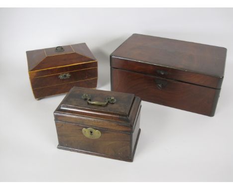 A Georgian mahogany Tea Caddy of sarcophagus shape, 9in, a Jewel Box with satinwood stringing and a 19th Century mahogany Wri