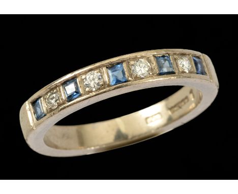 A Sapphire and Diamond half Eternity Ring pavé-set alternating step-cut sapphires and brilliant-cut diamonds in 18ct white go