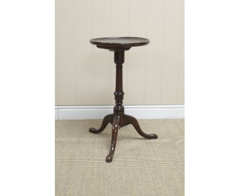 An 18th Century oak Wine Table with dished circular top on turned column and tripod base, 13in