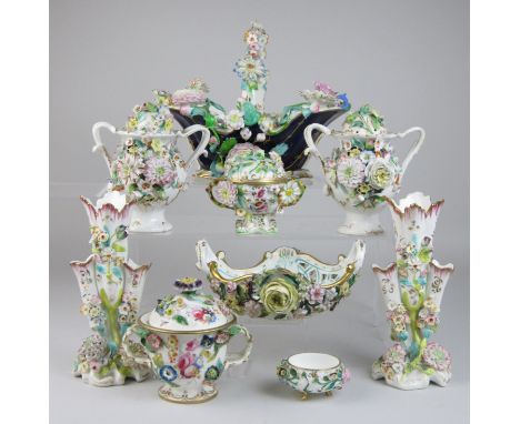 A collection of Coalbrookdale-type floral encrusted Porcelain, comprising two baskets, pair of spill vases, pair of pot pourr