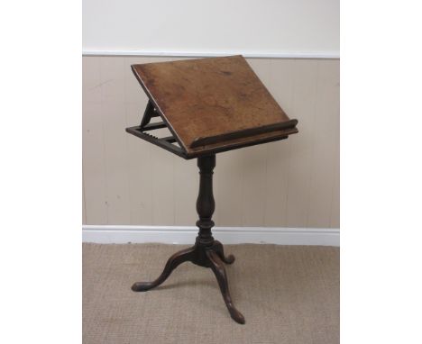 A 19th Century mahogany Reading Stand with adjustable rectangular top on baluster turned column and tripod base, 2ft, repaire