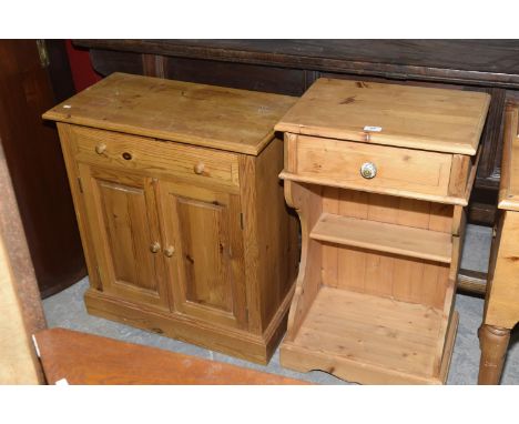 A pine side cabinet with a single drawer above a single shelf and a second cabinet with a drawer above two cupboard doors. (2