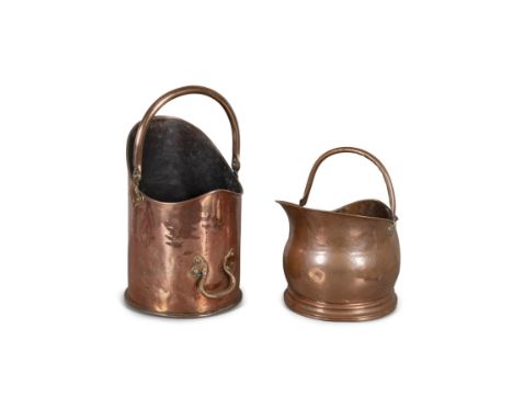 A VICTORIAN POLISHED COPPER SWING HANDLE FUEL BUCKET,of cylindrical form, 51cm high; together with a helmet-shaped coal bucke