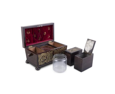 A REGENCY BRASS INLAID ROSEWOOD RECTANGULAR TEA CADDY,with flat domed lid enclosing a fitted interior with twin compartments 