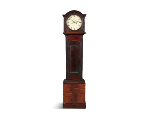 AN IRISH MID-19TH CENTURY MAHOGANY LONGCASE CLOCK the arched hood and circular glazed door enclosing a white painted dial wit
