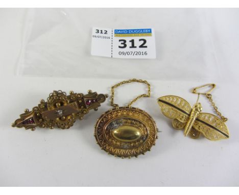 Victorian ruby and diamond bar brooch stamped 9ct, mourning brooch and filligree insect brooch Condition Report Click here fo
