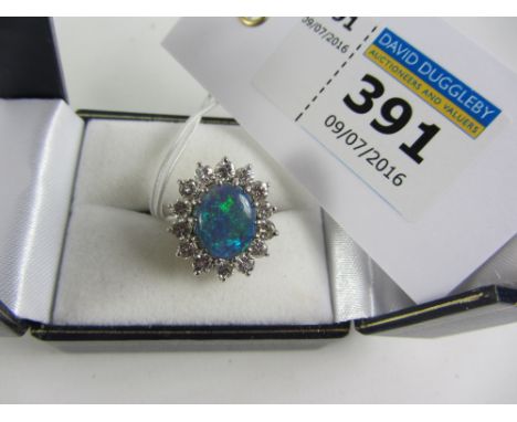 Blue opal and diamond cluster white gold ring stamped 18ct Condition Report Click here for further images, condition, auction