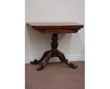 William IV mahogany card table, swivel fold over baize line top, raised on carved and turned pedestal base fitted with four s