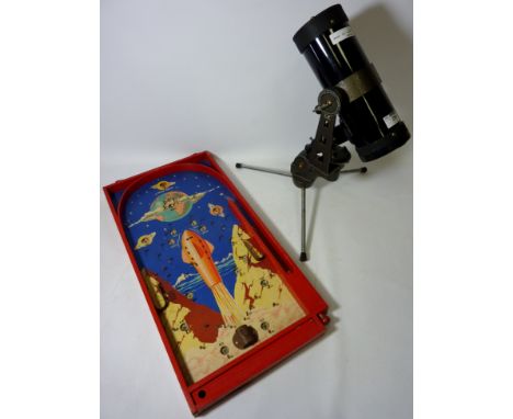 Tasco 302132 600mm telescope and pinball board with rocket decoration  Condition Report Click here for further images, condit