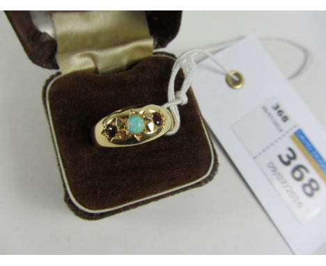 22ct gold ring set with garnets and opal hallmarked Condition Report Click here for further images, condition, auction times 