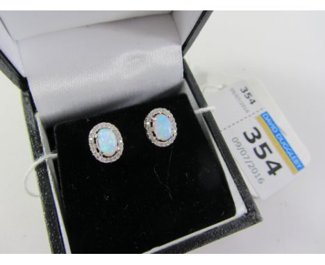 Pair of opal cluster dress ear-rings stamped 925 Condition Report Click here for further images, condition, auction times & d