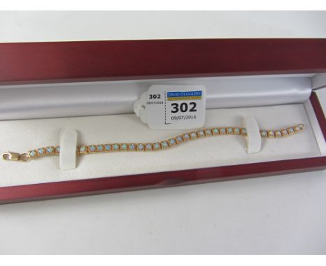 Rose gold plated opal set bracelet stamped 925 Condition Report Click here for further images, condition, auction times & del