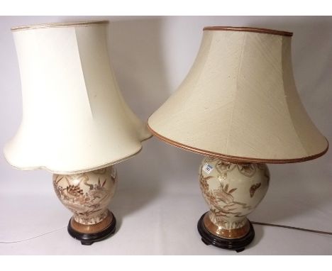 Pair oriental design table lamps H40cm (excluding shade) Condition Report One lamp requires re-wiring, shades do not match. C