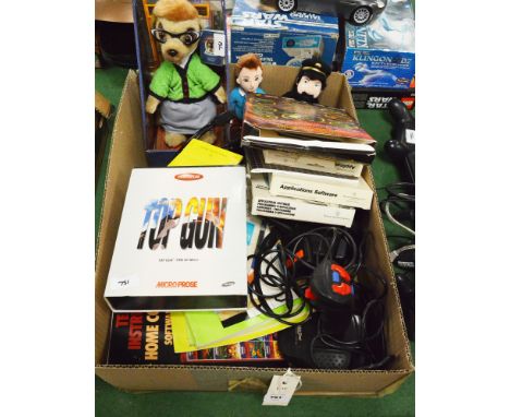 A Texas Instruments TI-99/4A retro computer; together with games to include Top Gun; joystick controller; and other toys.