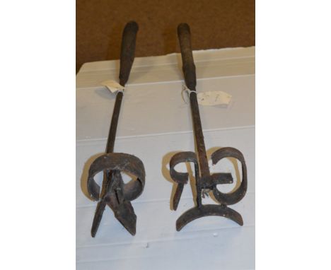 Two vintage branding irons.