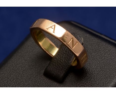 Yellow metal ring, inscribed 'Jeanne', of octagonal form, unmarked, 7.2g.