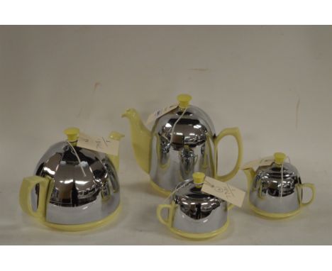 Mid 20th Century Celtic four piece tea service, to include: tea pot, coffee pot, milk jug, and sugar bowl.