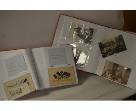 Two albums containing an assortment embroidered World War 1 postcards and silk handkerchiefs; and other vintage postcards dep