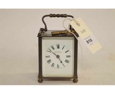 A small carriage clock by John Walker, South Molton, with French movement.