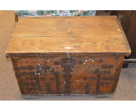 A 19th Century iron bound pine trunk, the inside of the lid painted with a ship theme, 87cms wide.