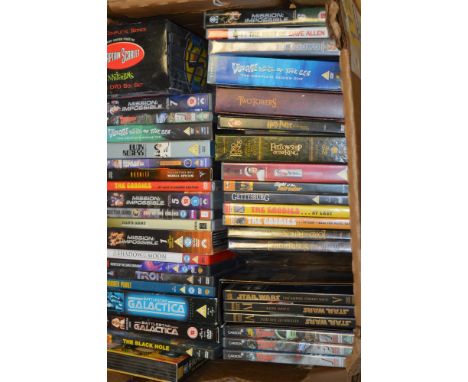 A box of DVDs, titles to include: Lord of the Rings; Star Wars; The Goodies; Harry Potter; Captain Scarlet; Star Trek; Battle