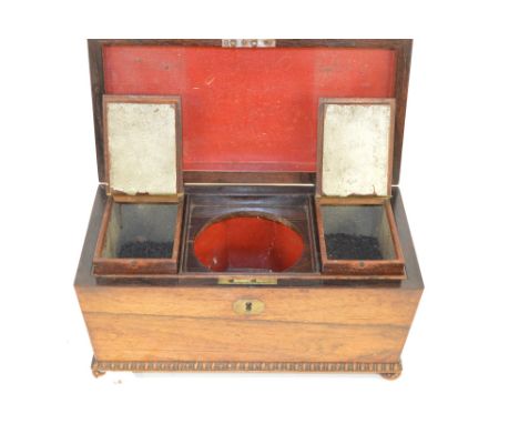 A late Regency rosewood sarcophagus tea caddy, missing it's mixing bowl.