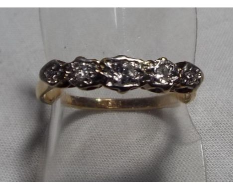 A lady’s 9ct gold and five diamond ring, approx. weight 1.6 grams, size O ½, boxed. Est. £60 - £80.