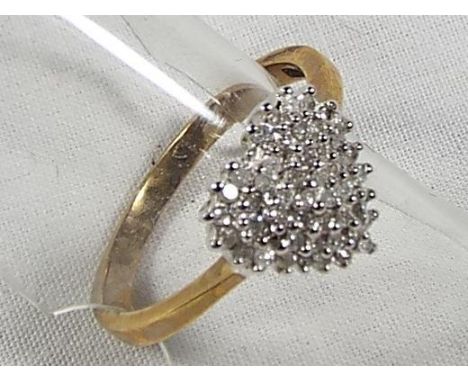 A lady's 9 carat gold 25 pt 1/4 carat diamond cluster ring, size P, approx 3.0 gm - Est £60 - £80