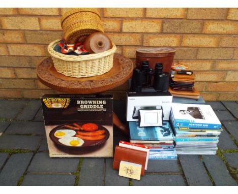 A carved wooden occasional table 37 cm (h) x 43 cm (d), an assortment of cotton reels buttons and sewing accessories in vario