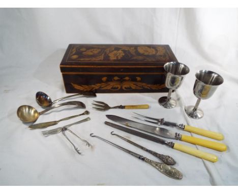 A good quality wooden box with floral decoration containing a quantity of  flatware, plated ware, included in the lot is two 