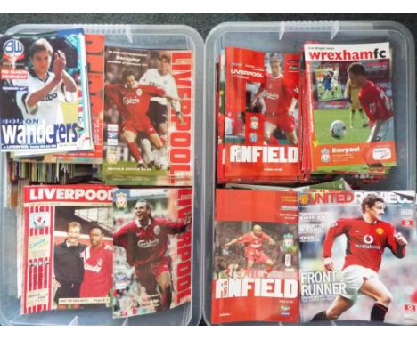 A large collection of football programmes and magazines predominantly relating to Liverpool football club but also Manchester